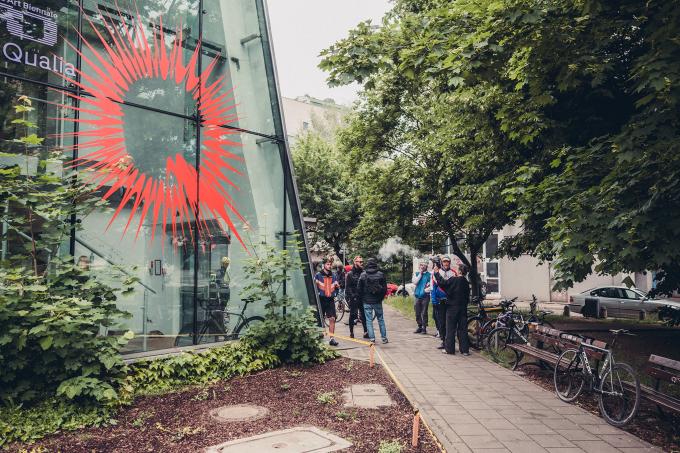 A group of people standing in front of the art centre