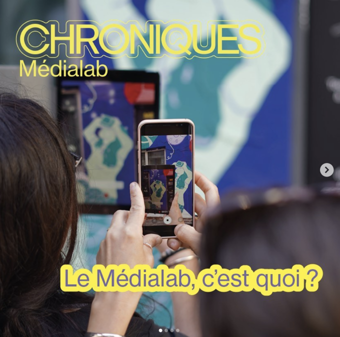 Two hands are holding a mobile phone, taking a picture